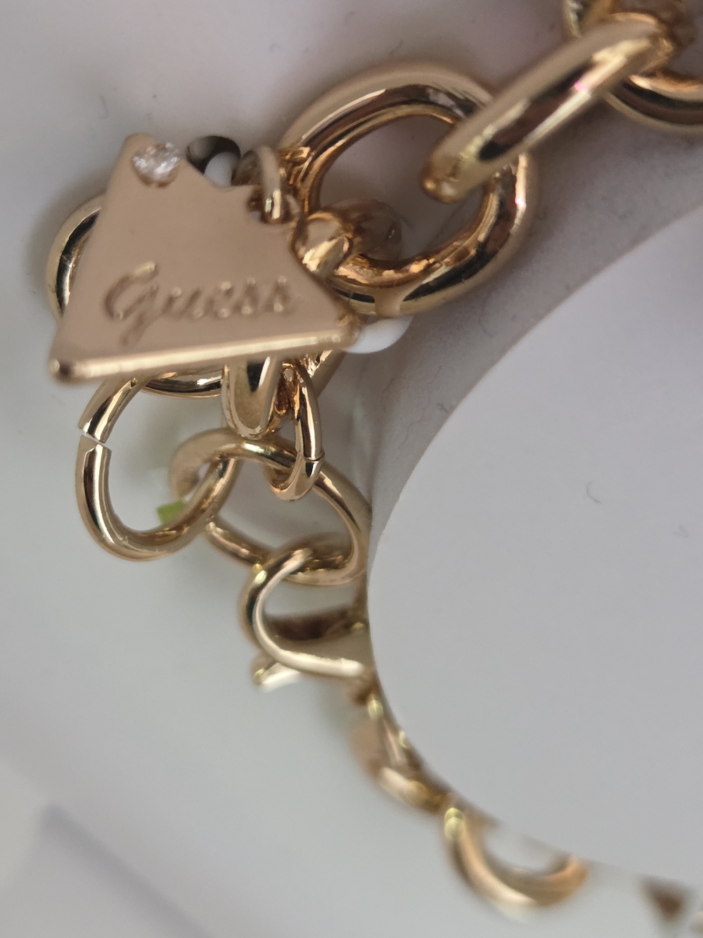 GUESS Gold-Tone Pink Charm Bracelet - Picture 7 of 7